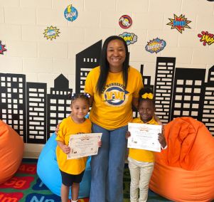  Ms. Jenkins with Olivia Townsend and C'yani Brinson. 